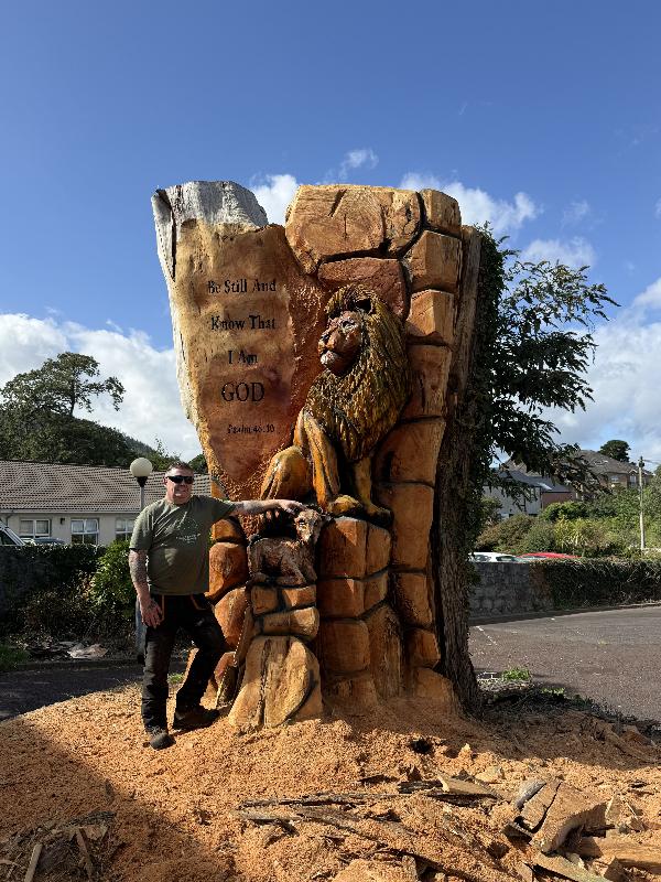 Lion & Lamb Stunp renovation — chainsaw carving by Woodaknot chainsaw carving & sculpting