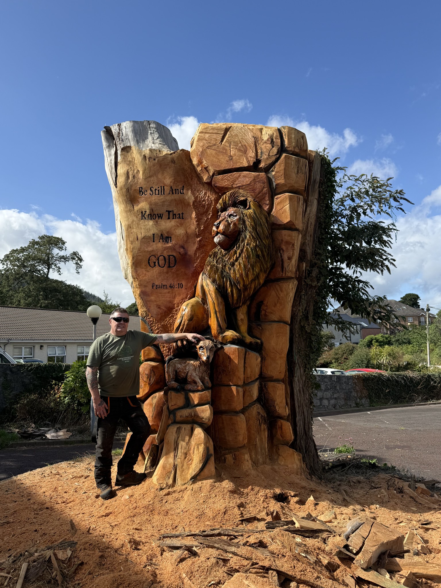 Lion & Lamb Stunp renovation — chainsaw carving by Woodaknot chainsaw carving & sculpting