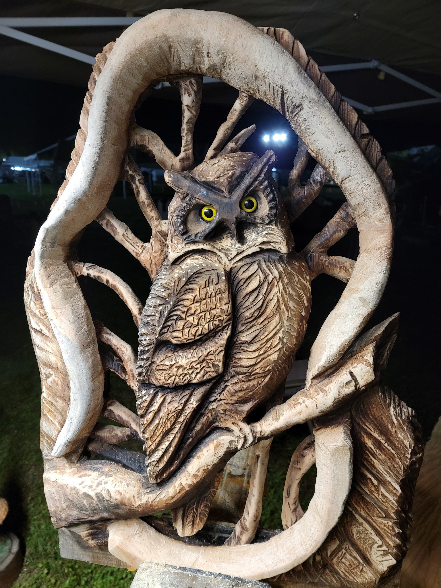 Perched owl among carved branches — chainsaw carving by The Grateful Tech