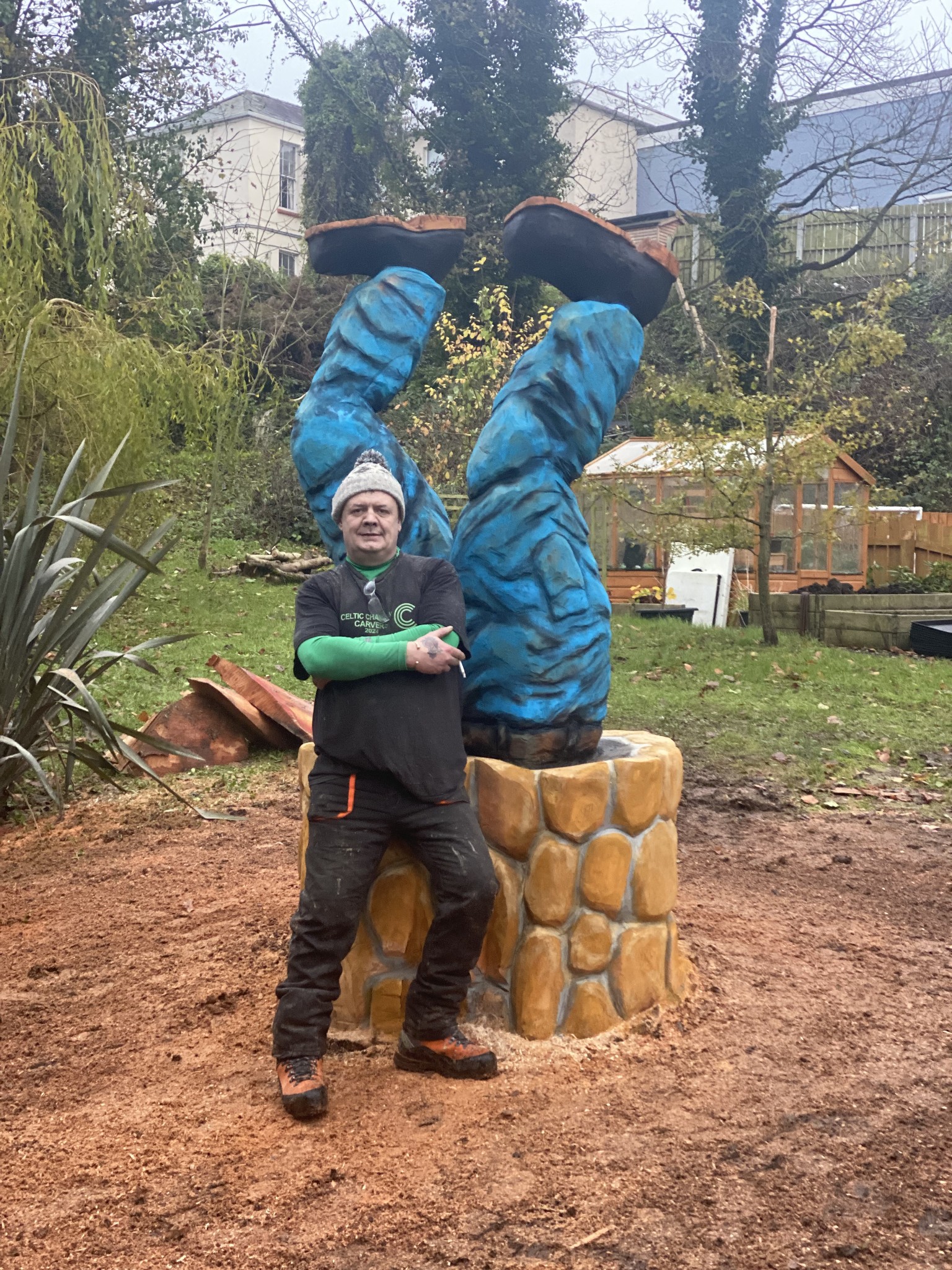 Upside-down carved legs sycamore stump renovation — chainsaw carving by Woodaknot chainsaw carving & sculpting