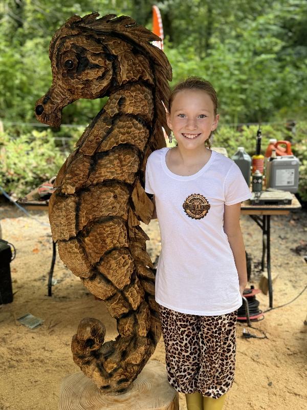 Chainsaw-carved seahorse sculpture — chainsaw carving by Woodaknot chainsaw carving & sculpting