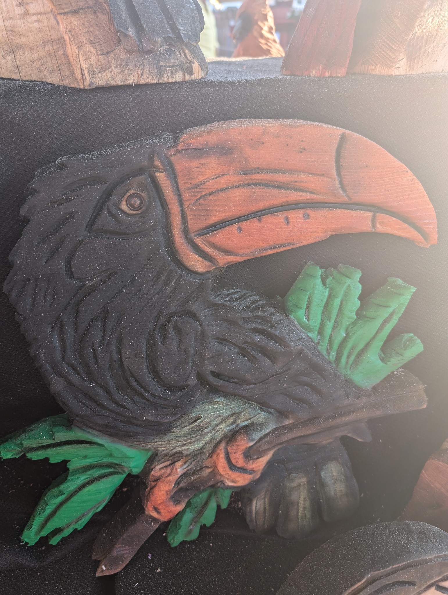 toucan head carving — chainsaw carving by The Grateful Tech